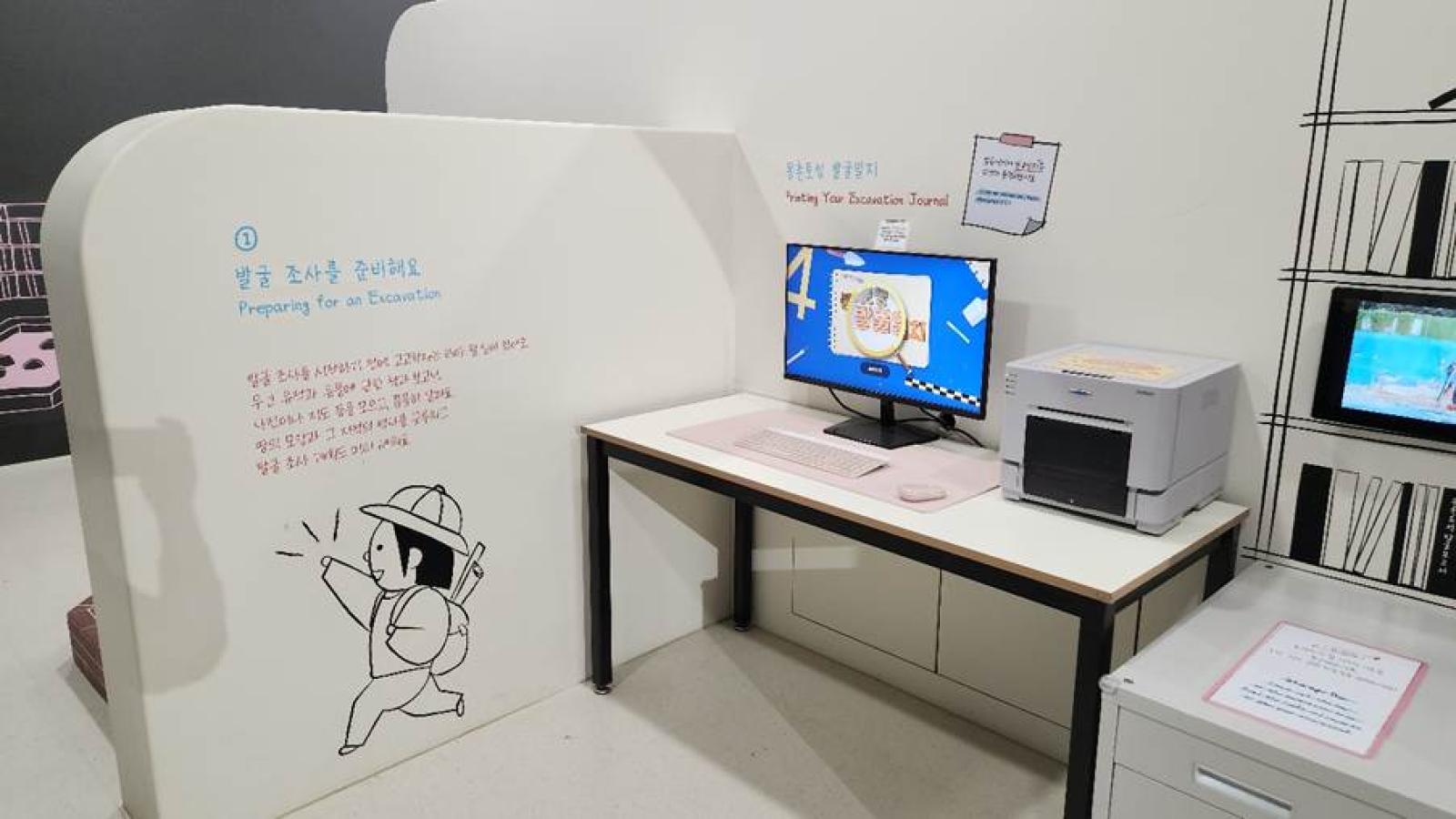 A computer on a desk AI-generated content may be incorrect.